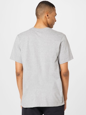 Nike Sportswear T-Shirt 'Swoosh' in Grau