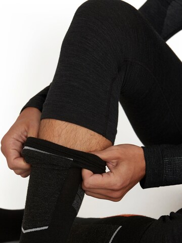 FALKE Regular Sporthose '3/4'‌‌‌‌‌‌ in Schwarz