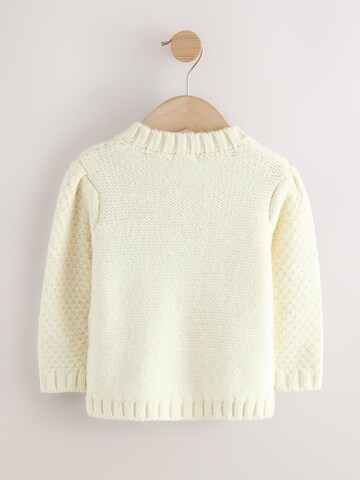 Next Neuletakki värissä beige