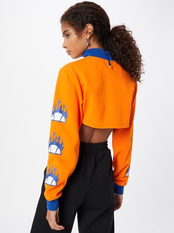 oranžinė About You x Ellesse Marškinėliai 'Pieta Long Sleeve Funnel Neck Top'