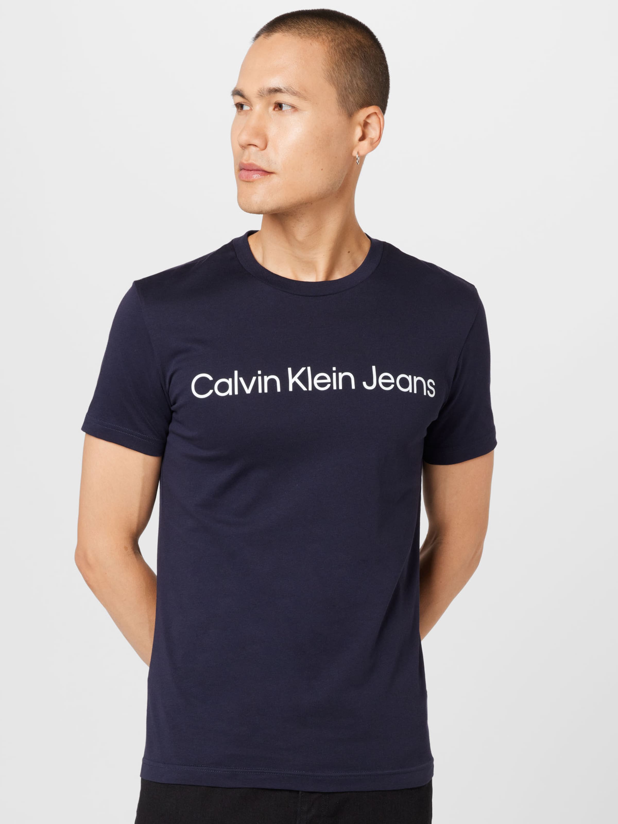 Introducir 74+ imagen calvin klein jeans blue shirt