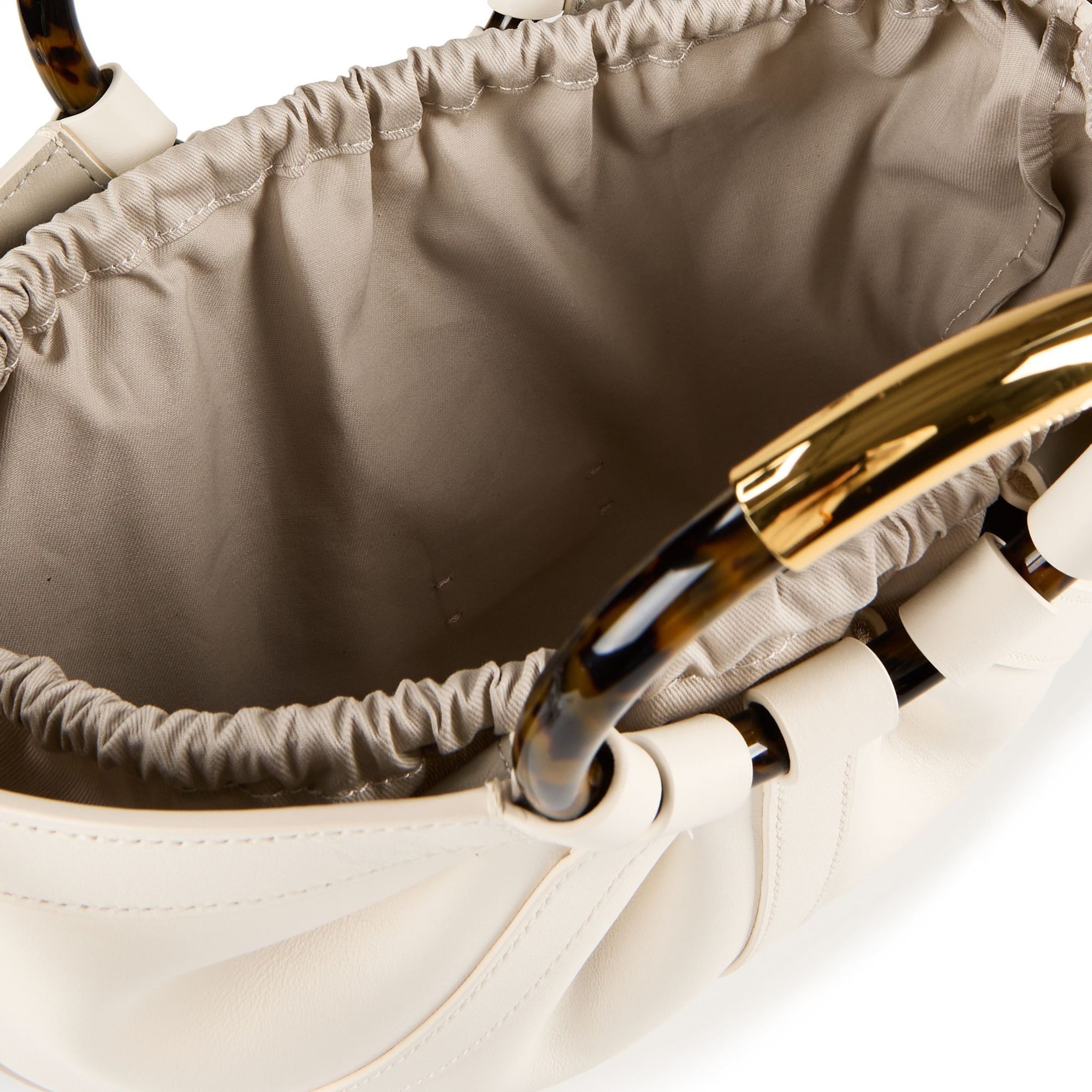 Coccinelle Handtasche 'Shell' in Beige