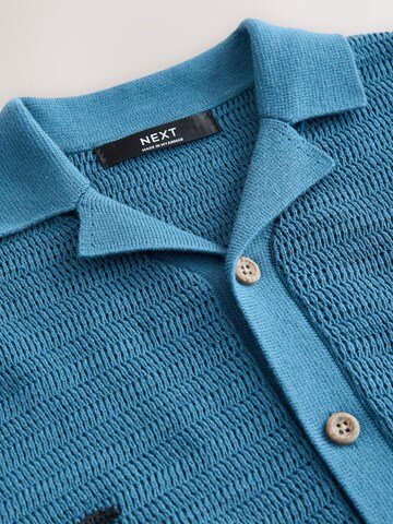 Next Pletena jopa | modra barva