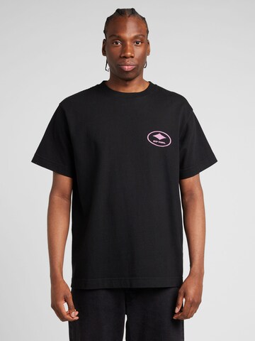 T-Shirt fonctionnel RIP CURL en noir : devant