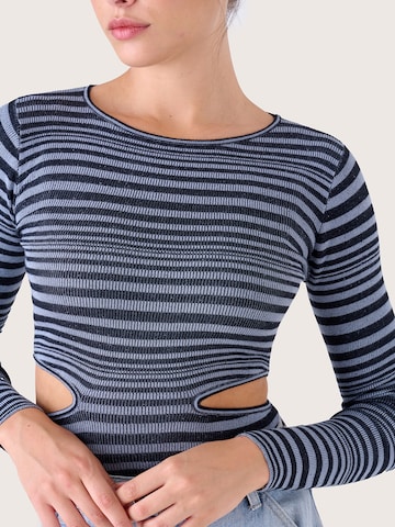 Pull-over 'MAVI' Camomilla en noir : devant