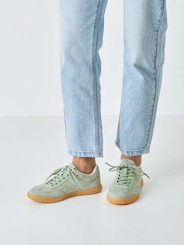 Baskets basses Tamaris en vert