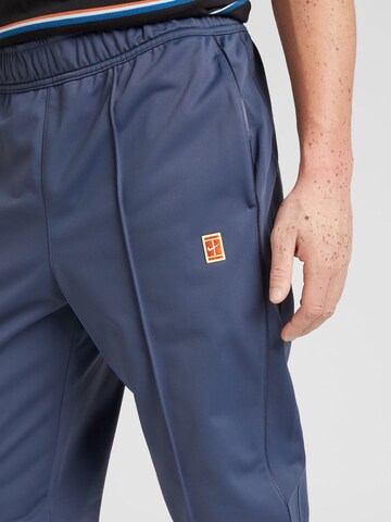 NIKE Regular Sports trousers 'Court HERITAGE' in Blue