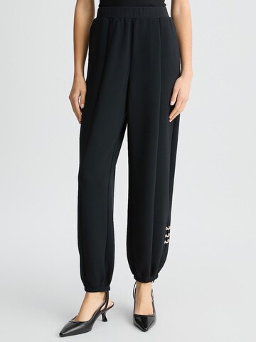 Liu Jo Regular Trousers in Black: front