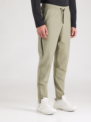 Nike Sportswear Slim fit Trousers in Green: front