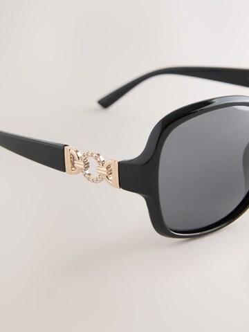 Lunettes de soleil Next en noir
