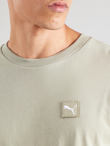 PUMA Paita 'Ess Elevated' värissä vihreä
