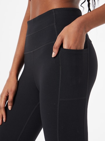 SKECHERS Skinny Workout Pants in Black