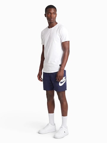 Nike Sportswear Voľný strih Nohavice 'CLUB' - Modrá
