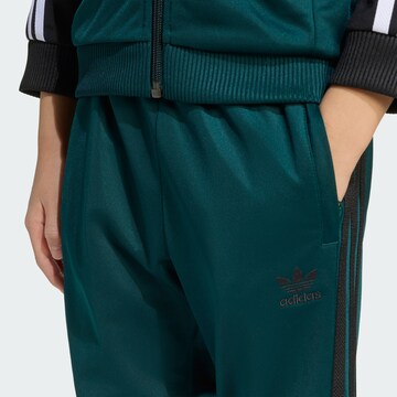 zaļš ADIDAS ORIGINALS Treniņtērps 'Adicolor'