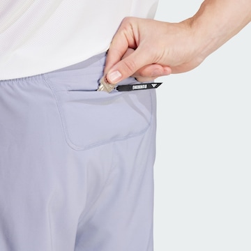 regular Pantaloni sportivi 'Own The Run' di ADIDAS PERFORMANCE in lilla