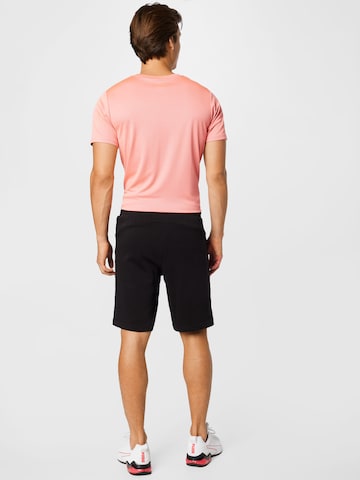 PUMA Normalny krój Spodnie sportowe 'Essentials' w kolorze czarny