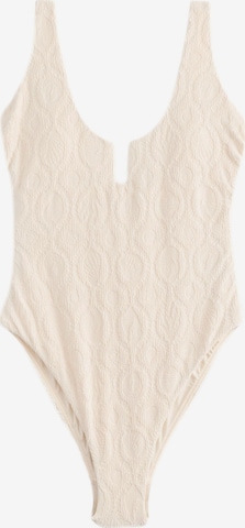 NextBustier Jednodijelni kupaći kostim - bež boja: prednji dio