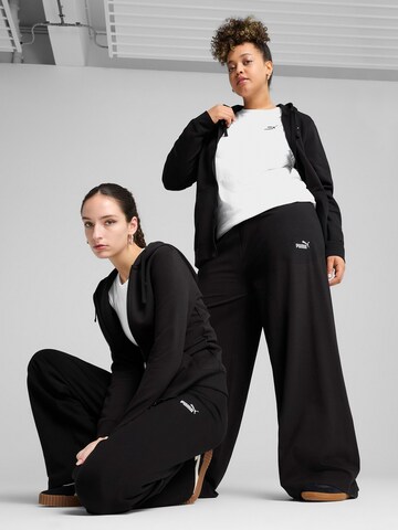 PUMA Wide leg Sports trousers 'ESS No. 1' in Black: front
