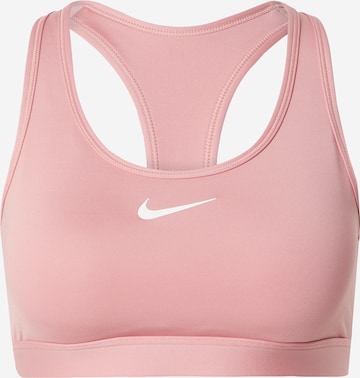 NIKE Sports bra 'Swoosh' in Pink: front