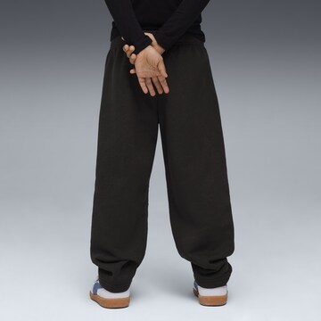 PUMA Tapered Trousers 'Moody Cat' in Black
