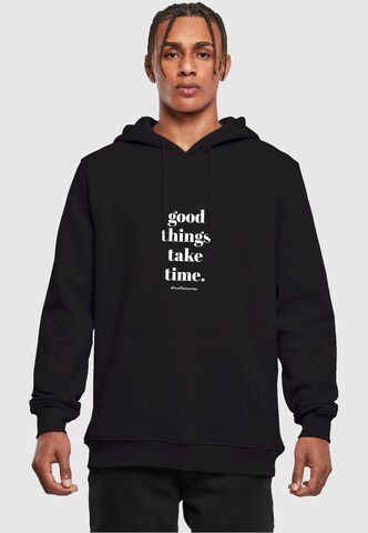 Merchcode Sweatshirt 'Good Things Take Time' in Zwart: voorkant