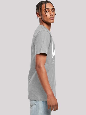 Maglietta 'DC Comics Justice League Movie Wayne Aerospace' di F4NT4STIC in grigio