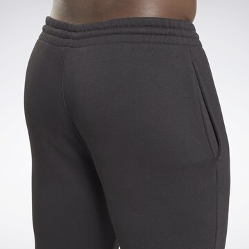 Reebok Tapered Workout Pants in Black