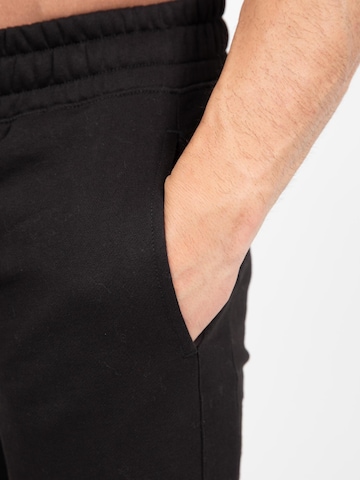 Slimfit Pantaloni 'Leon' di Gorilla Wear in nero