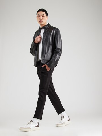 Tapered Pantaloni con pieghe 'CHASY' di DRYKORN in nero
