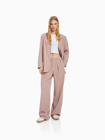 Bershka Loose fit Pleat-Front Pants in Pink