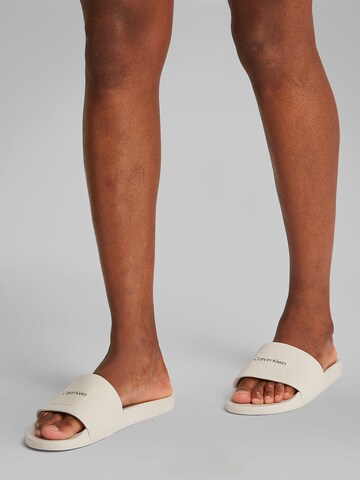 Calvin Klein Pantofle – šedá