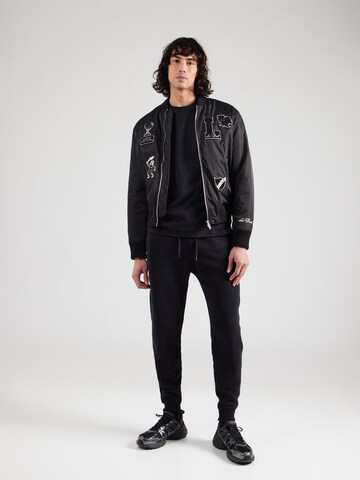 HOLLISTER - Tapered Pantalón en negro