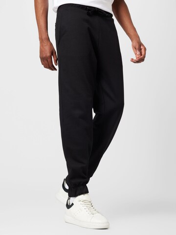 HUGO Red Tapered Trousers 'Dchard' in Black: front