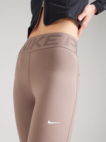 NIKE Kitsas Spordipüksid, värv pruun