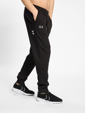 Hummel Regular Workout Pants 'Court' in Black: front