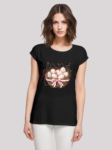 T-shirt 'Osterei Nest Korb Dekor' F4NT4STIC en noir : devant