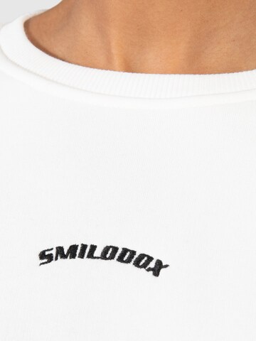 Sweat-shirt 'Kyrie' Smilodox en blanc