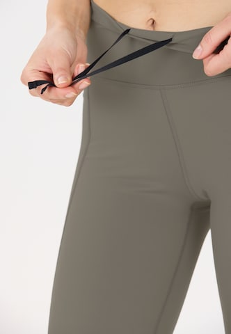 Athlecia Skinny Sportbroek 'Aliya' in Groen