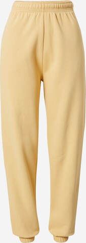 Kendall for ABOUT YOU Loose fit Pants 'Dillen' in Yellow: front