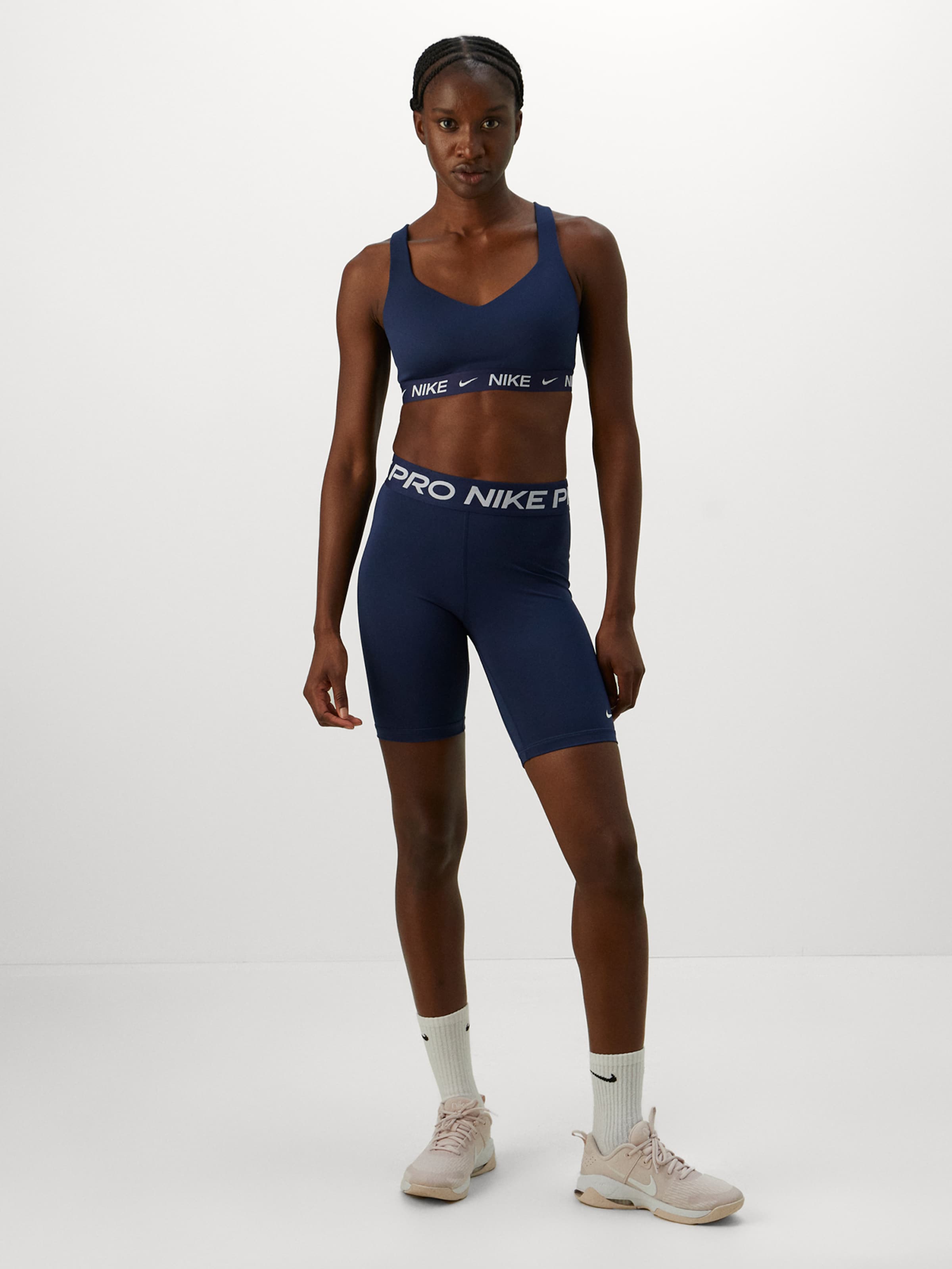 nike sweat shorts and sports bra