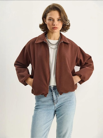 Bianco Lucci Tussenjas in Bruin