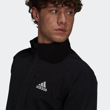 ADIDAS SPORTSWEAR Sports jacket 'Own The Run' in Black