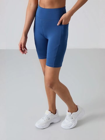 Tommy Life - Tapered Leggings 'Gamaschen' em azul