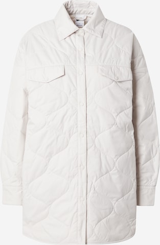 Nike Sportswear Between-season jacket 'ESSNTL' in Beige: front