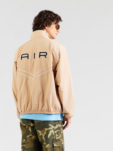 bēšs Nike Sportswear Starpsezonu jaka 'Air': no priekšpuses