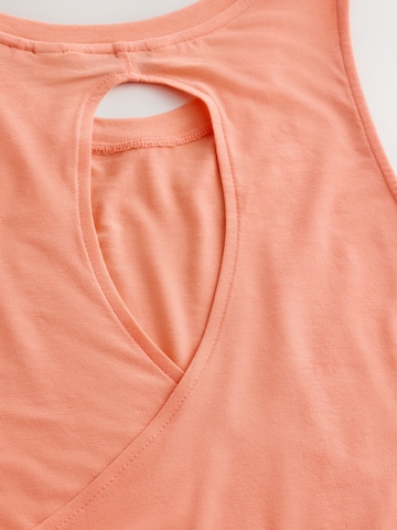 Haut de sport Next en orange