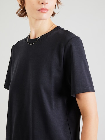 Tricou 'NUFIRA' de la NÜMPH pe negru