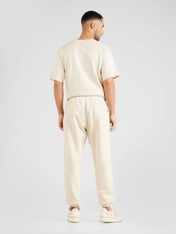 ELLESSE Tapered Broek 'Garsi' in Beige