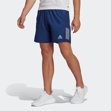 regular Pantaloni sportivi 'Own The Run' di ADIDAS SPORTSWEAR in blu: frontale