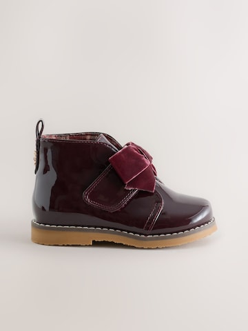 Next - Botas en rojo